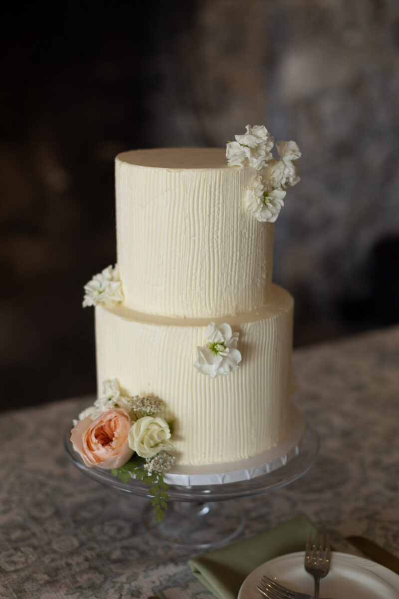 Wedding cake with florals on it