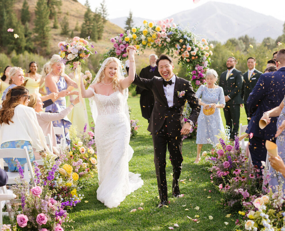 A wedding ceremony in Sun Valley Idaho with wild floral bouquets, photographed by a los angeles wedding photographer