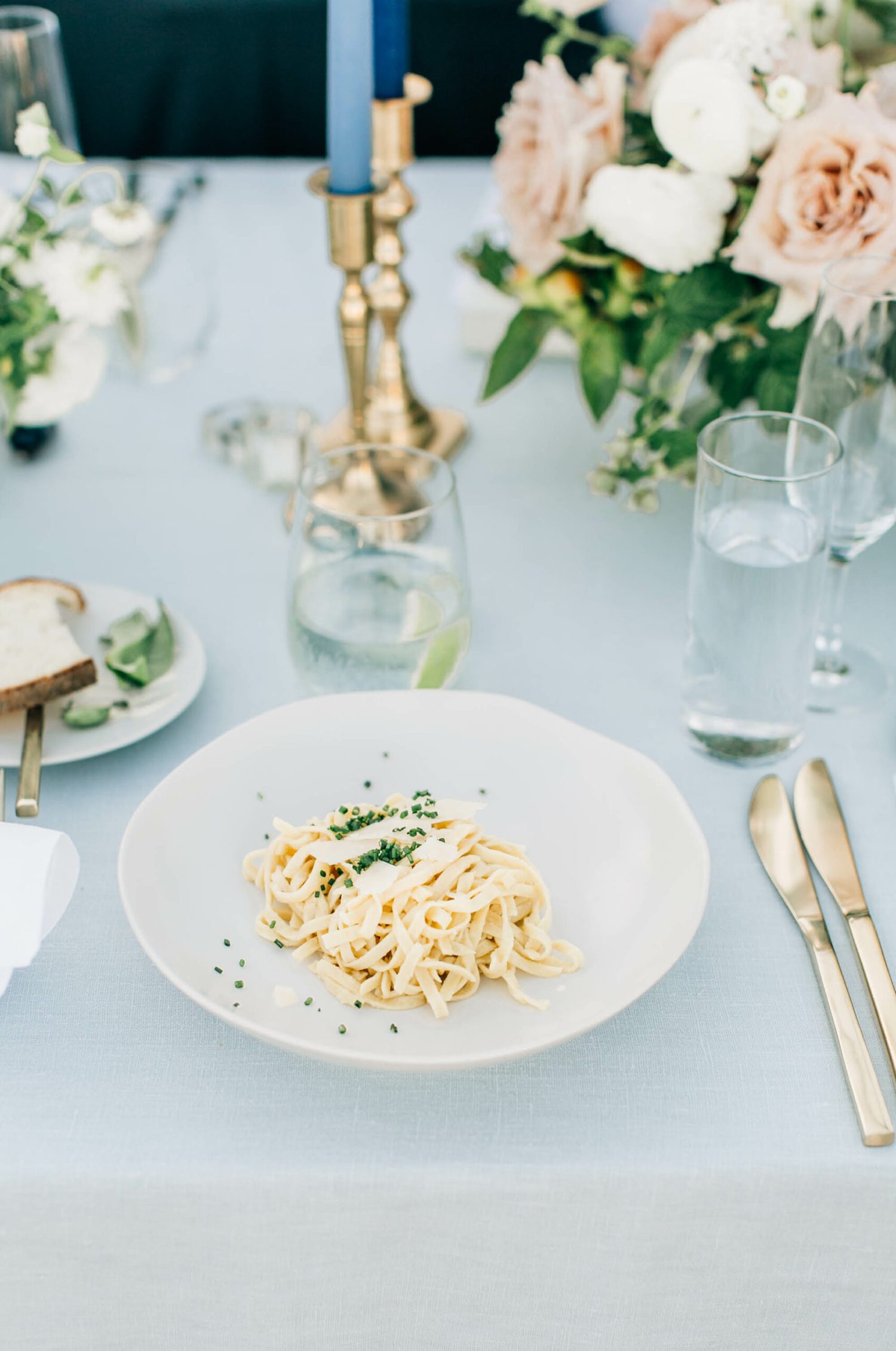 Fresh pasta and florals at wedding reception at the admiral's house in seattle